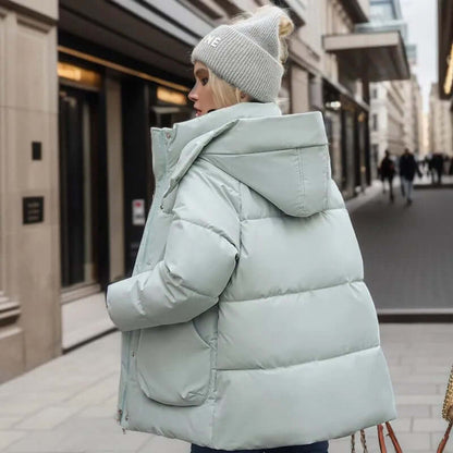 Damen Daunenjacke – Wasserabweisend – Mit Kapuze – Reißverschluss & Taschen