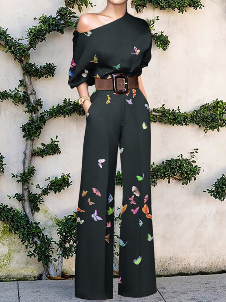 Schulterfreier Jumpsuit mit Blumenmuster aus leichter Baumwollmischung